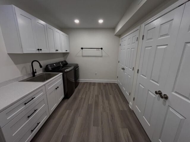 We created a simple laundry space in an unfinished area of the basement and cleaned up the look of the 2x4 storage rack with double closet openings that has no partition between them - freestanding shelving units or totes can now be easily moved around for the client’s needs.

We used a @saniflousa Sanicom 1 gray water pump for the washing machine and sink. This heavy duty unit has the capacity to handle washing machine discharge directly without having to have the unsightly hose going into a utility sink. We did the cost analysis and this was a good middle of the road option for this application.